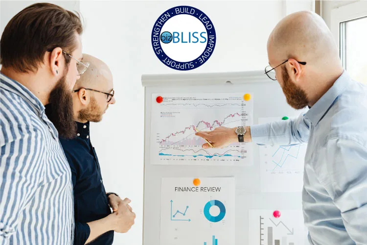 Financial-Review bizBLISS business team reviewing accurate financial data